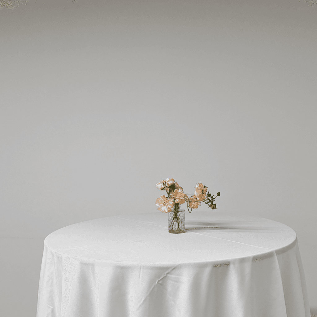 The scene is set indoors, in a sparsely decorated room with minimalistic white walls and soft lighting that gently illuminates the space, creating a serene and peaceful atmosphere.