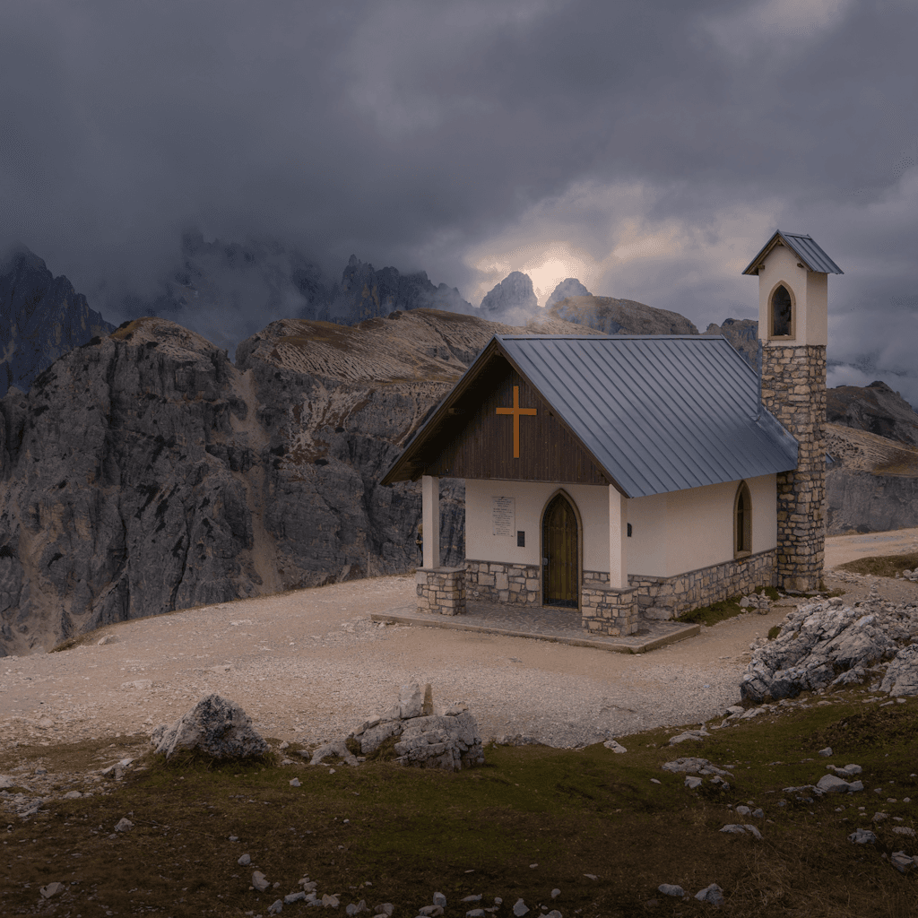 The scene is set in a breathtaking mountainous landscape, suggesting an outdoor environment.