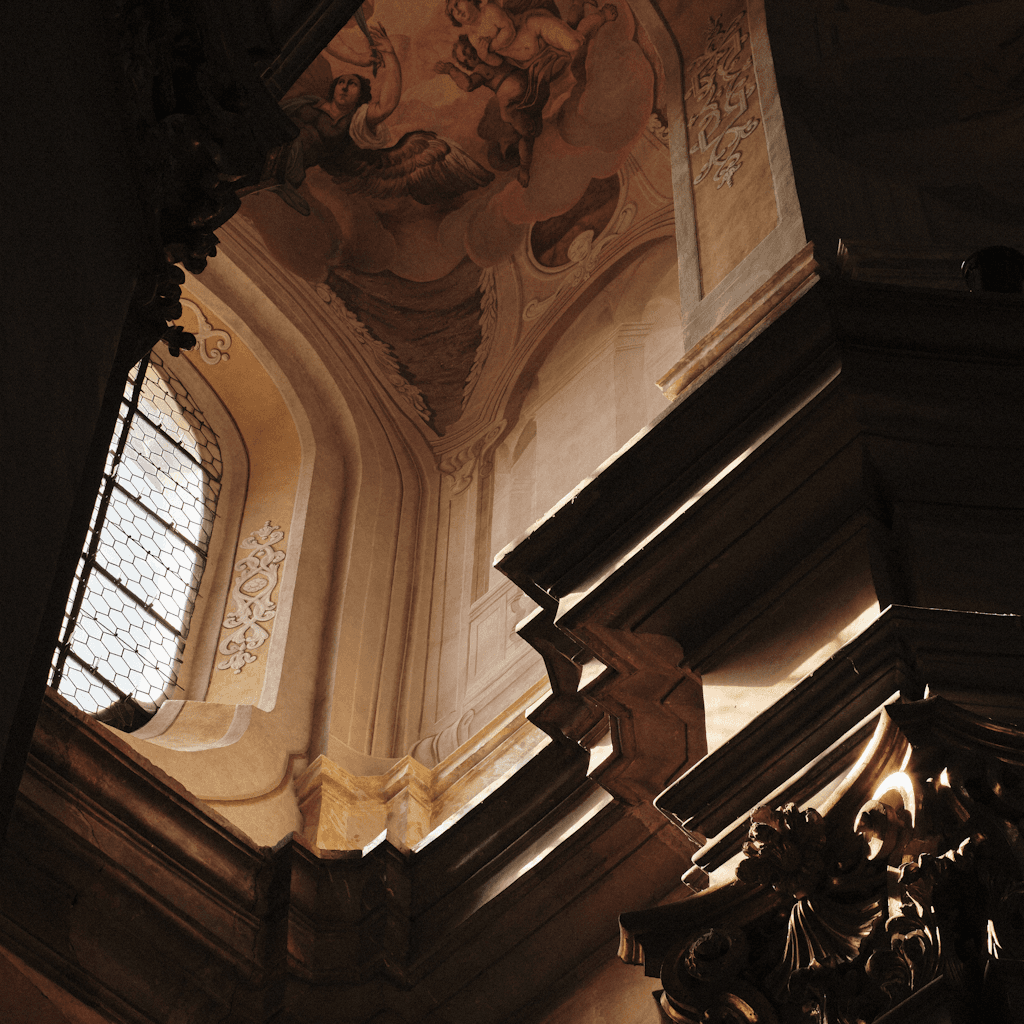The scene is indoors, likely within a grand cathedral or historical building.